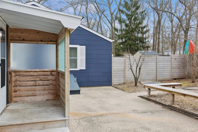 view of patio / terrace featuring fence