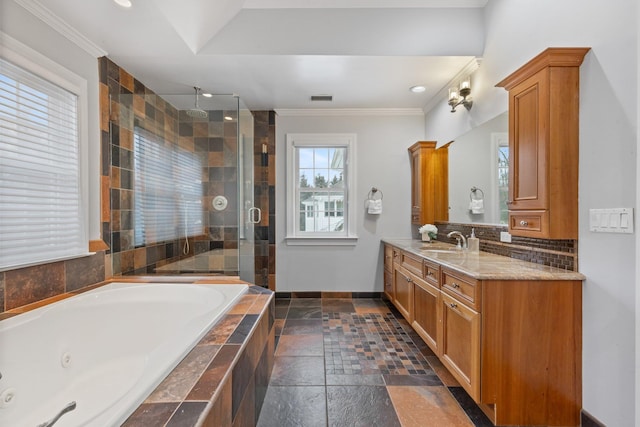 bathroom with crown molding, vanity, shower with separate bathtub, and tasteful backsplash