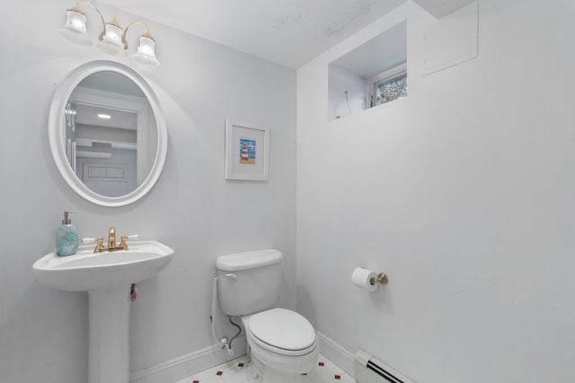 bathroom featuring sink and toilet