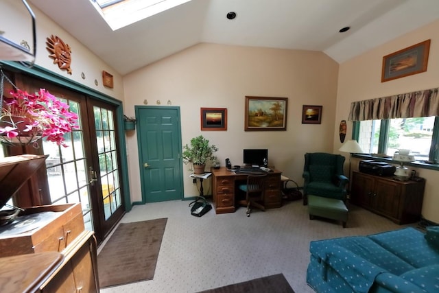 office space featuring carpet floors, vaulted ceiling with skylight, and french doors