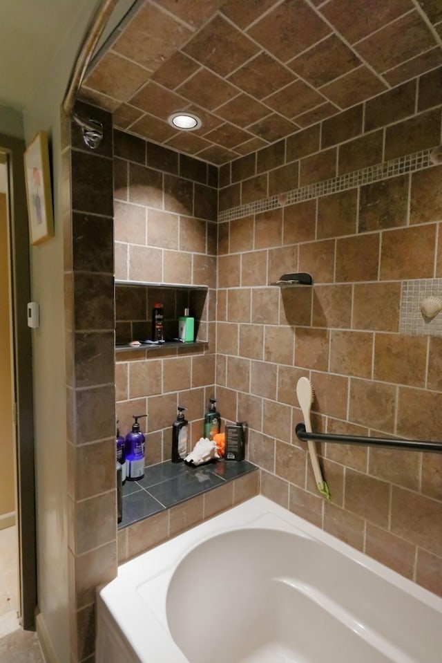 full bathroom featuring walk in shower and a bathing tub