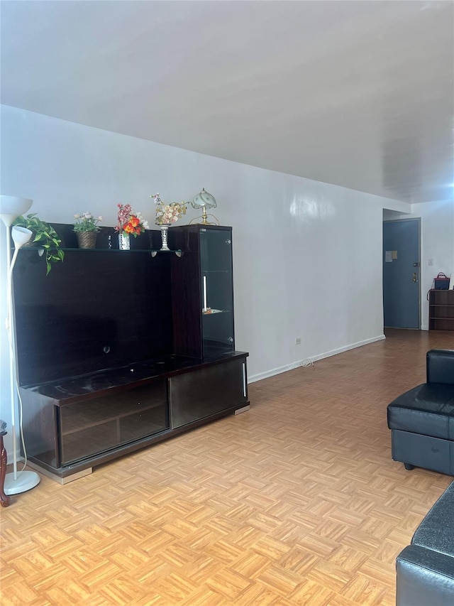 living room featuring light parquet flooring