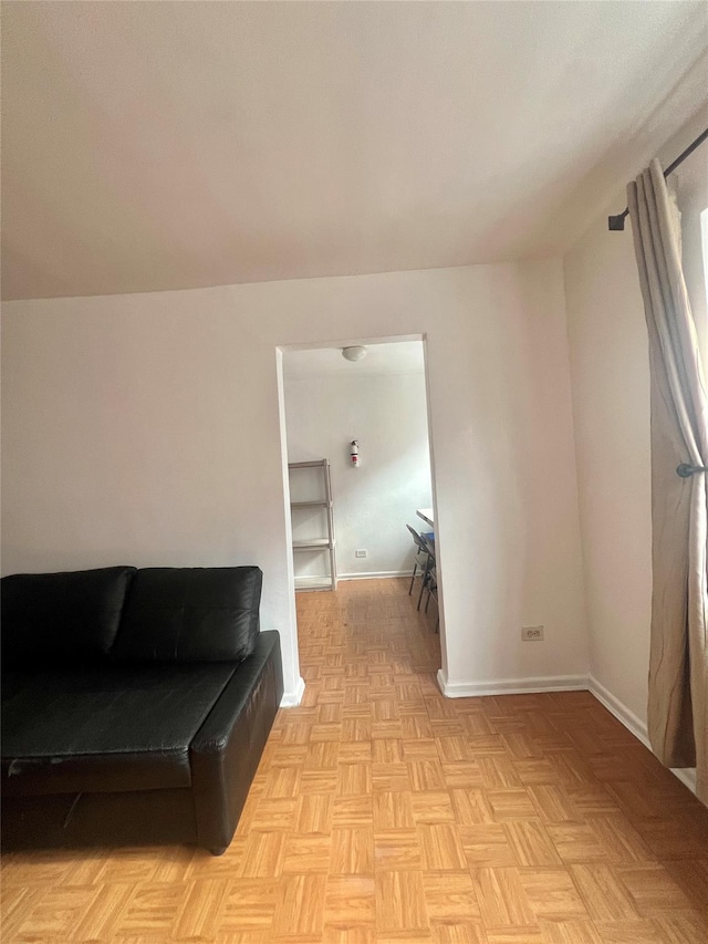 living room featuring light parquet flooring