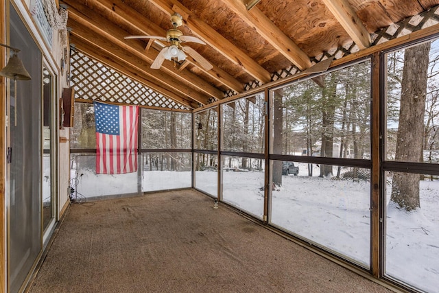 unfurnished sunroom with lofted ceiling and ceiling fan