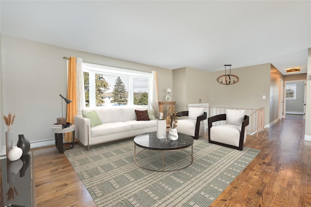 living room with dark hardwood / wood-style flooring