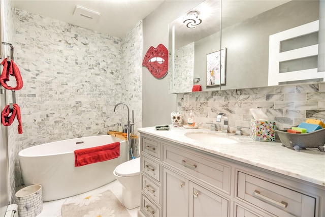 bathroom with vanity, a tub to relax in, toilet, a baseboard radiator, and decorative backsplash