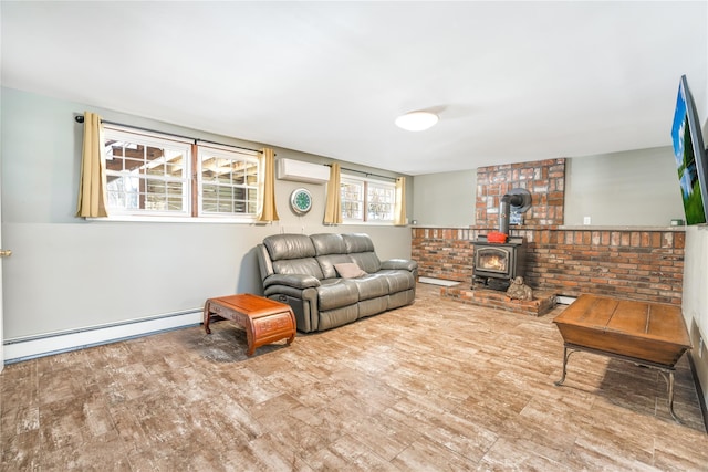 living room with a wood stove, a wall mounted air conditioner, wood-type flooring, and baseboard heating