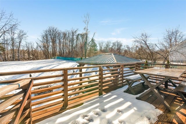 view of snow covered deck