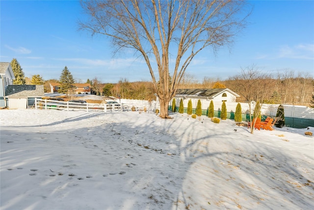 view of yard covered in snow