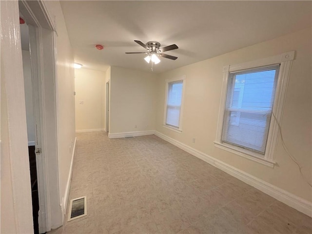 empty room with ceiling fan