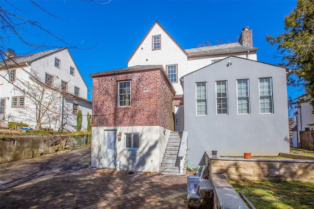 back of house featuring a patio