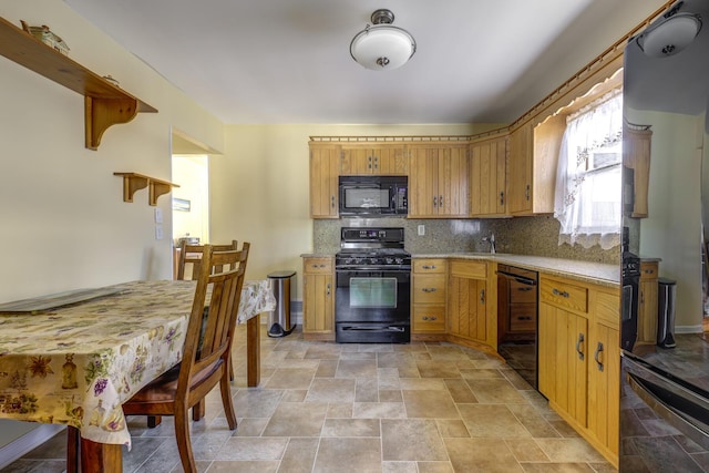 kitchen with wine cooler, decorative backsplash, and black appliances