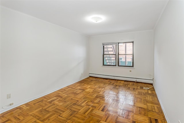 empty room featuring light parquet floors, ornamental molding, and baseboard heating