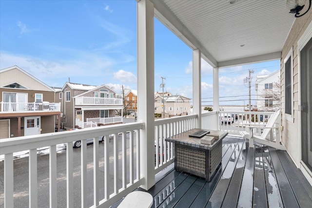 balcony featuring a residential view and a fire pit