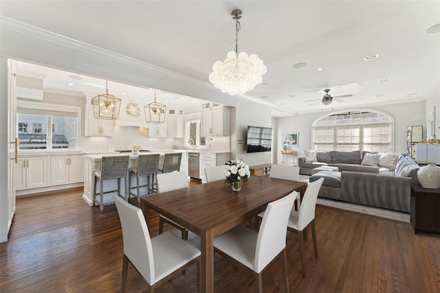 dining space with ornamental molding, dark wood finished floors, a ceiling fan, and recessed lighting