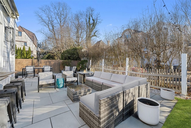 view of patio / terrace featuring a fenced backyard and an outdoor hangout area