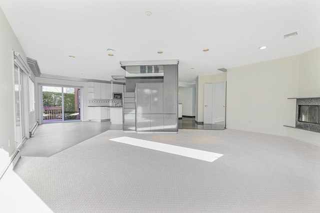 182-61 Avon Rd, Jamaica Estates, NY 11432 - interior space with a fireplace and a baseboard radiator