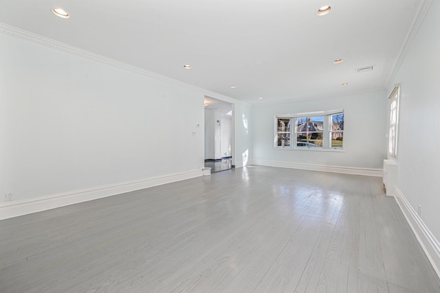 182-61 Avon Rd, Jamaica Estates, NY 11432 - unfurnished living room with hardwood / wood-style floors and crown molding