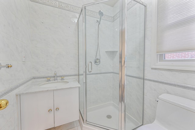 182-61 Avon Rd, Jamaica Estates, NY 11432 - bathroom with vanity, tile walls, an enclosed shower, and toilet