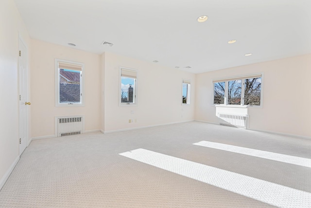 182-61 Avon Rd, Jamaica Estates, NY 11432 - carpeted empty room with radiator
