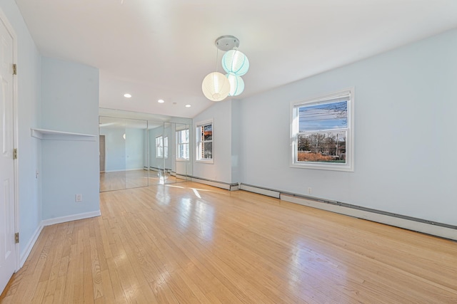 182-61 Avon Rd, Jamaica Estates, NY 11432 - unfurnished room featuring light hardwood / wood-style flooring and vaulted ceiling