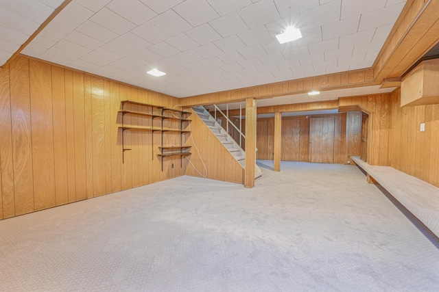 182-61 Avon Rd, Jamaica Estates, NY 11432 - basement with carpet flooring and wooden walls