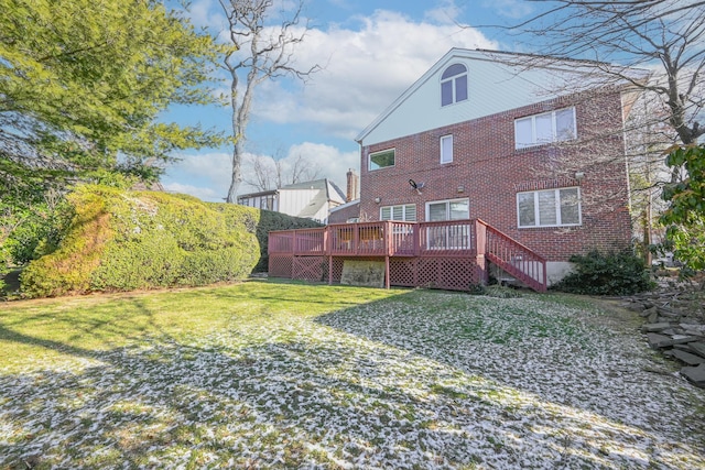 182-61 Avon Rd, Jamaica Estates, NY 11432 - back of house featuring a deck and a lawn