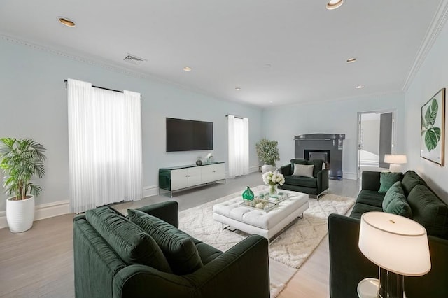 182-61 Avon Rd, Jamaica Estates, NY 11432 - living room with crown molding and light wood-type flooring