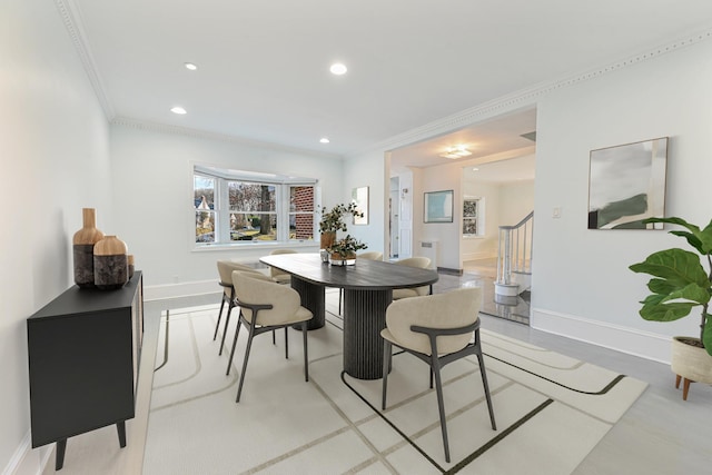 182-61 Avon Rd, Jamaica Estates, NY 11432 - dining area featuring crown molding and light wood-type flooring
