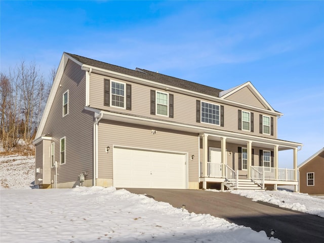 view of front facade featuring a garage and a porch