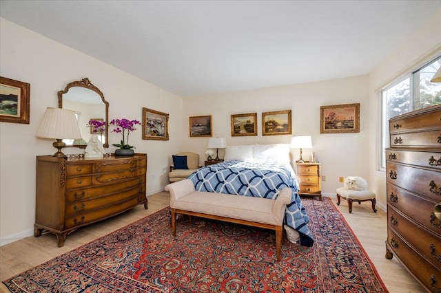 bedroom featuring baseboards