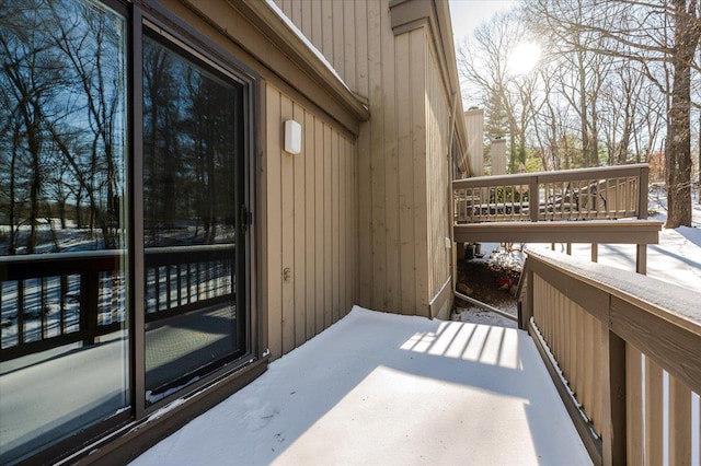 view of snow covered deck