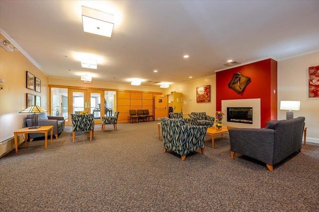 living room featuring carpet floors, recessed lighting, visible vents, ornamental molding, and a glass covered fireplace