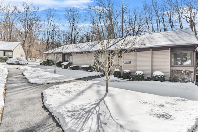 view of snow covered property