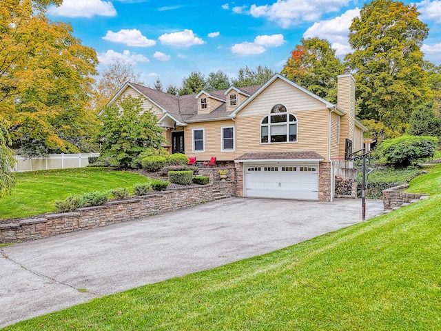 34 Clark Ln, Harriman, NY 10926 - view of front of house featuring asphalt driveway, a garage, a chimney, stone siding, and roof with shingles
