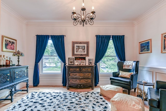 34 Clark Ln, Harriman, NY 10926 - sitting room featuring a chandelier, ornamental molding, a wainscoted wall, wood finished floors, and a decorative wall