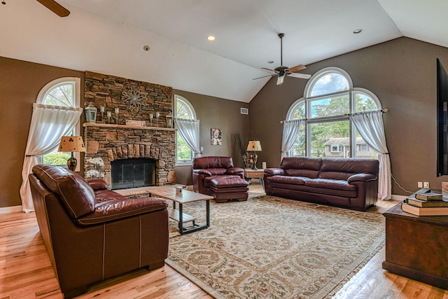 34 Clark Ln, Harriman, NY 10926 - living area with a ceiling fan, lofted ceiling, light wood-type flooring, and a stone fireplace