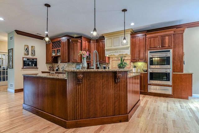 34 Clark Ln, Harriman, NY 10926 - kitchen featuring double oven, a warming drawer, light stone countertops, tasteful backsplash, and recessed lighting