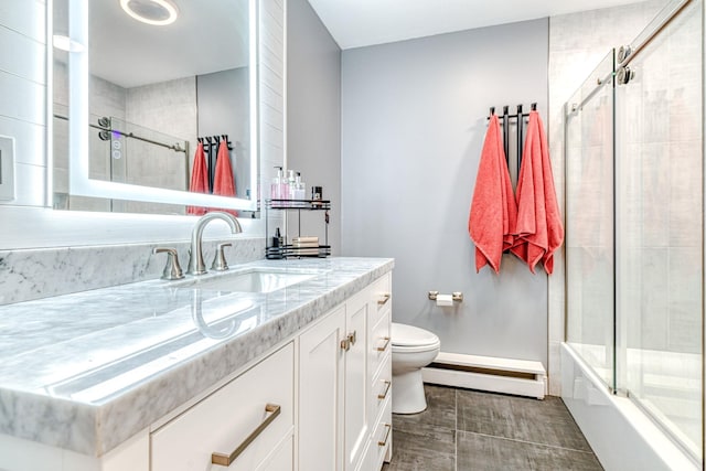 34 Clark Ln, Harriman, NY 10926 - bathroom featuring baseboard heating, vanity, toilet, enclosed tub / shower combo, and baseboards
