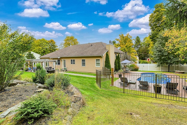 34 Clark Ln, Harriman, NY 10926 - rear view of house featuring a pergola, a patio area, and a chimney