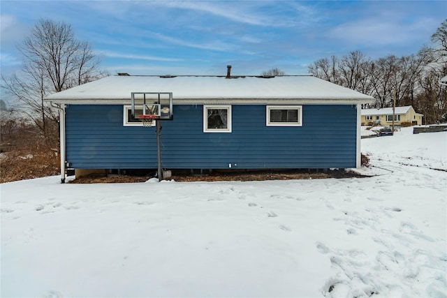 view of snow covered property