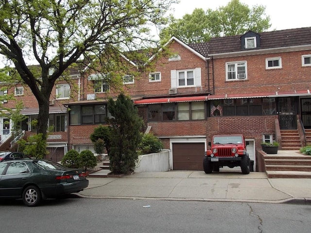 view of property featuring a garage