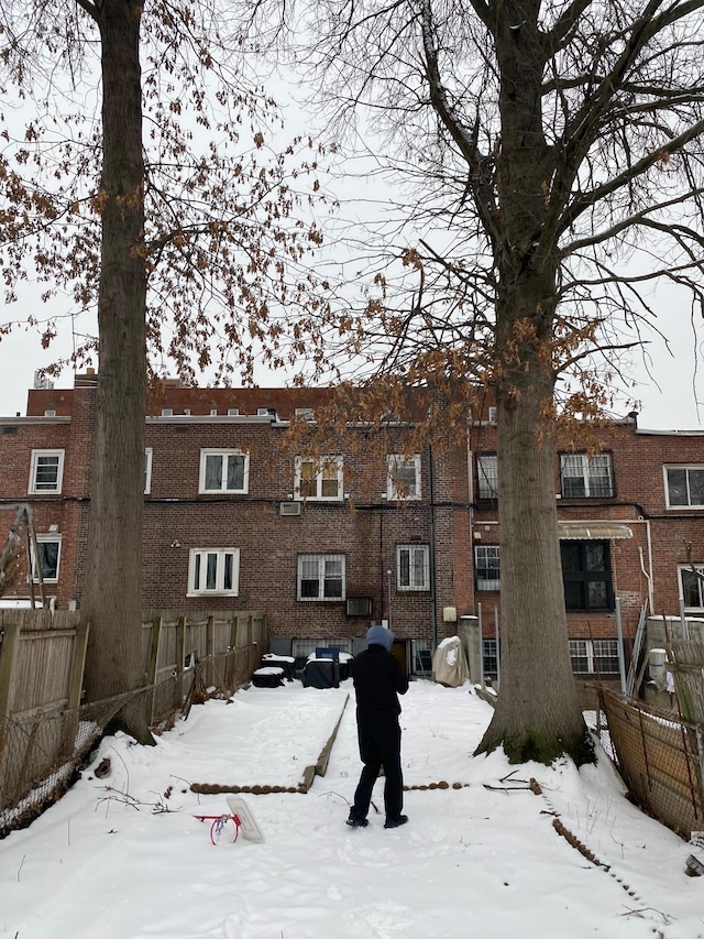 view of snow covered property