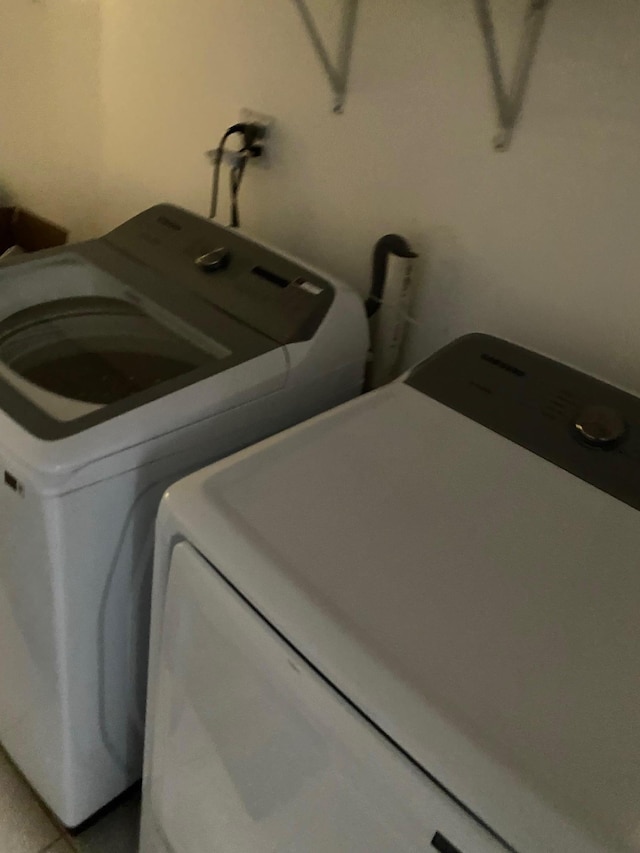 laundry room featuring separate washer and dryer