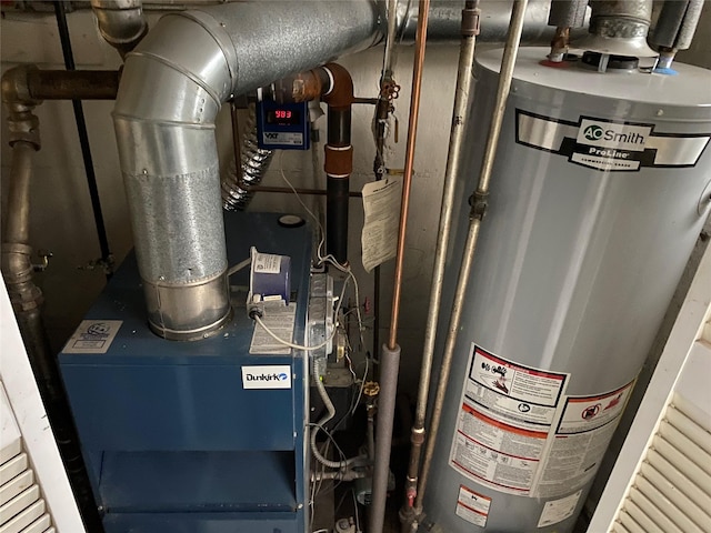 utility room with water heater