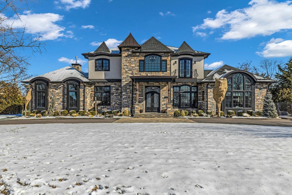 72 The Helm, East Islip, NY 11730 - french country home featuring stone siding