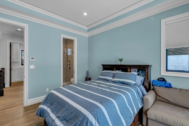 bedroom featuring ensuite bathroom, recessed lighting, baseboards, ornamental molding, and light wood-type flooring