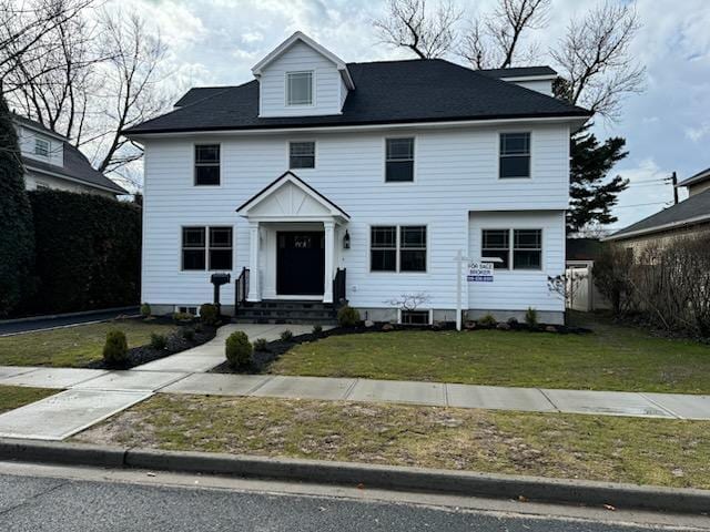 colonial house with a front lawn