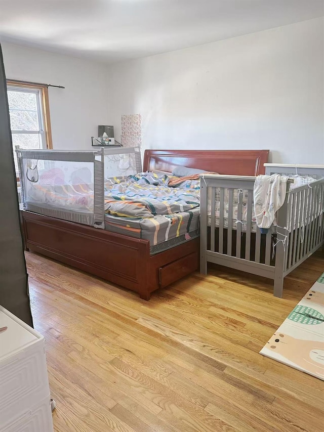 bedroom featuring light hardwood / wood-style floors