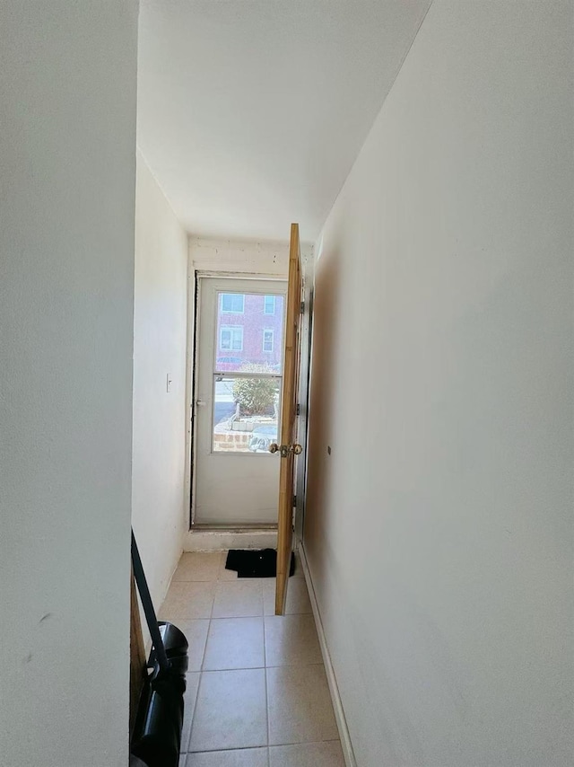entryway featuring light tile patterned flooring